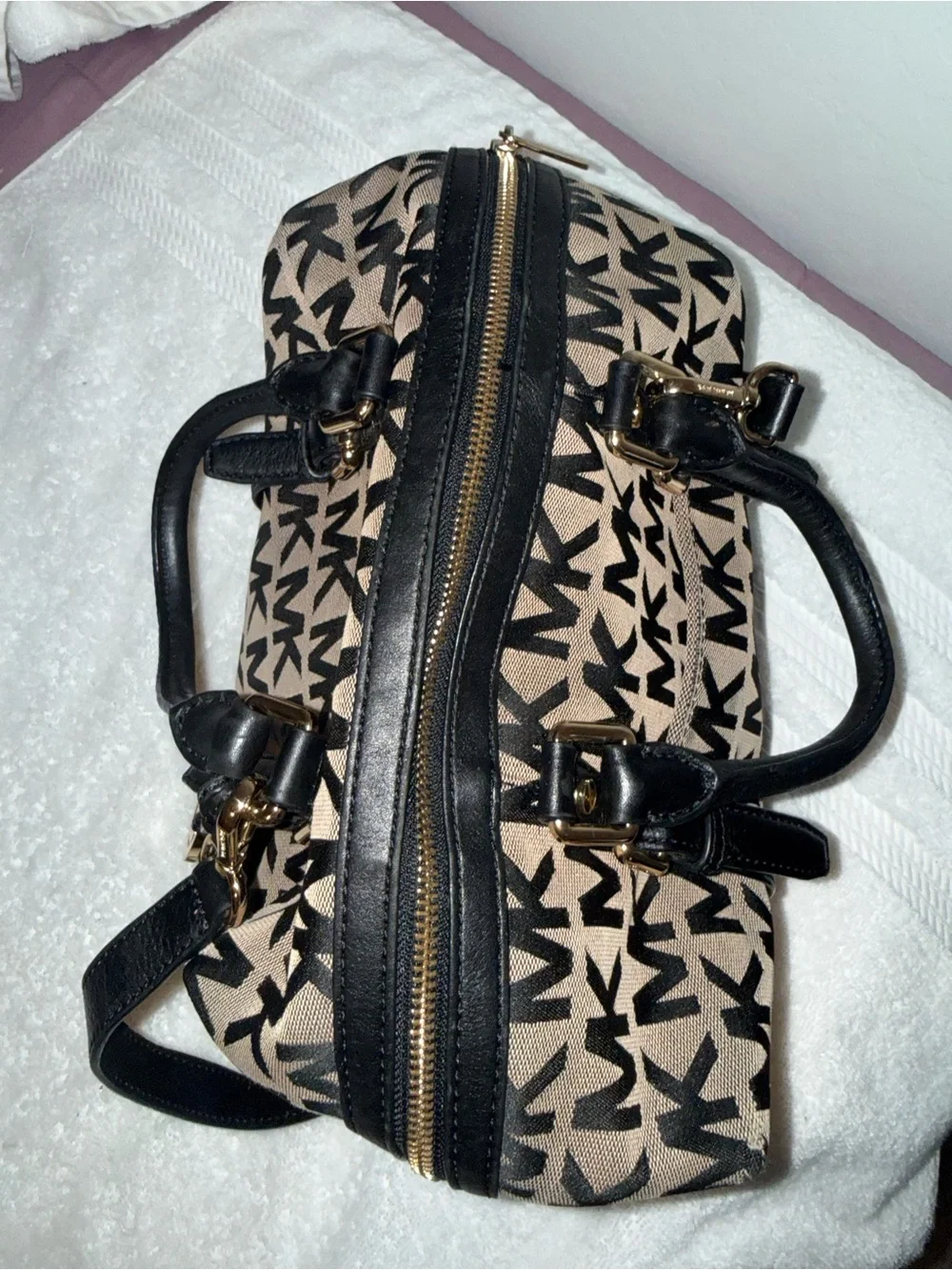 Michael Kors black duffle signature bag
